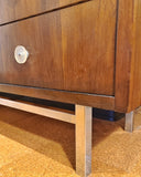 LOW WALNUT NINE-DRAWER DRESSER WITH LUCITE PULLS AND CHROME BASE