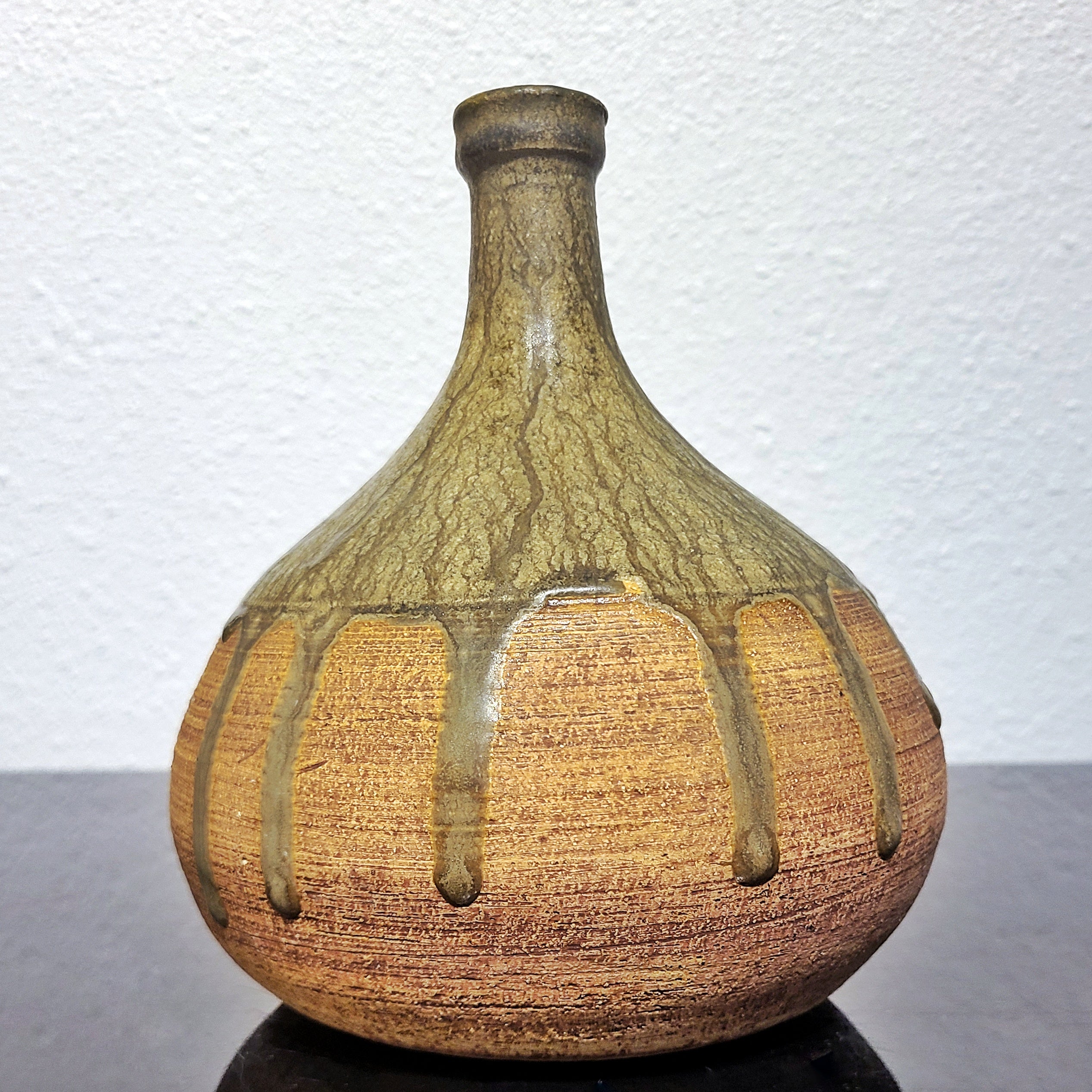 BULBOUS THIN NECKED STUDIO POTTERY VASE WITH GREEN DRIP