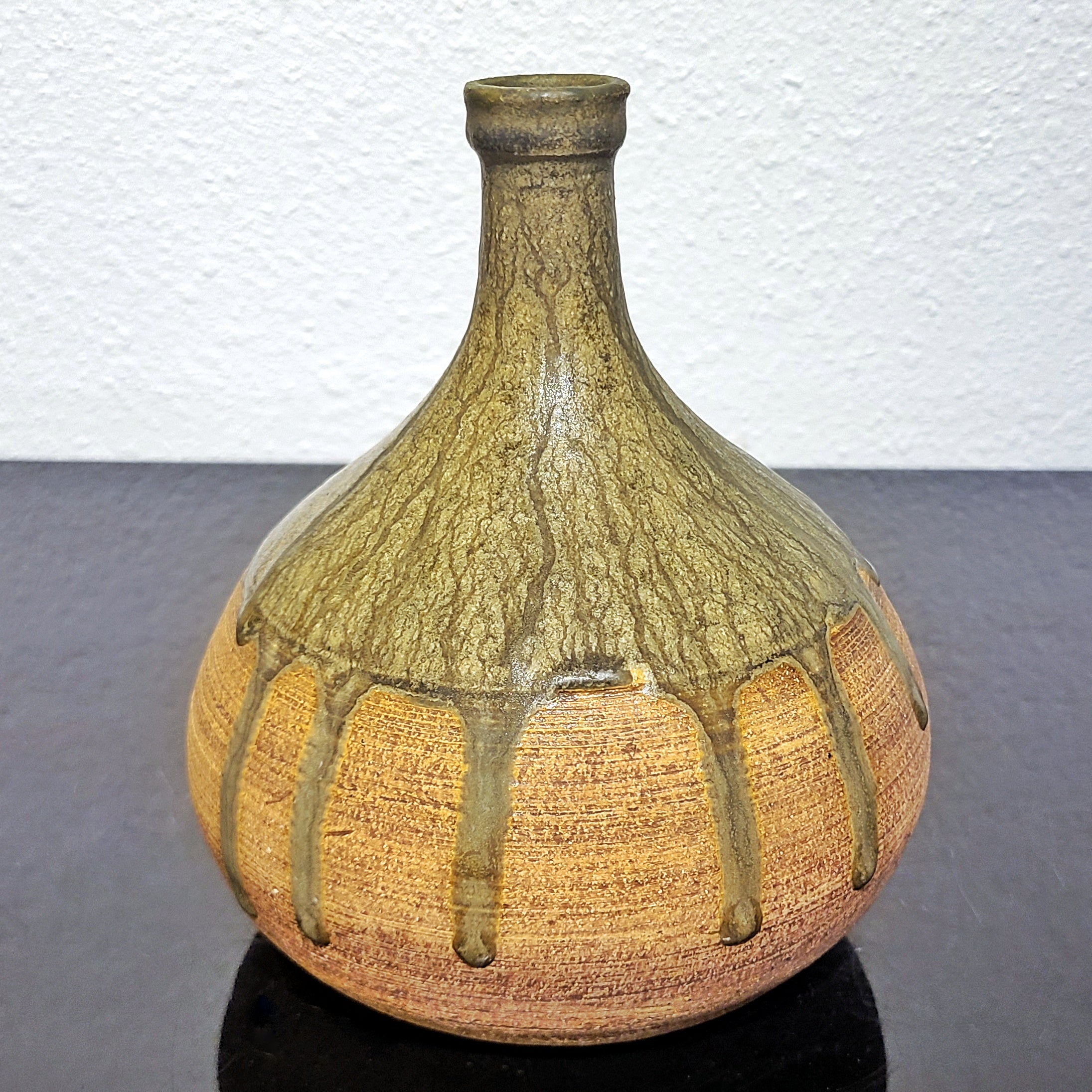 BULBOUS THIN NECKED STUDIO POTTERY VASE WITH GREEN DRIP