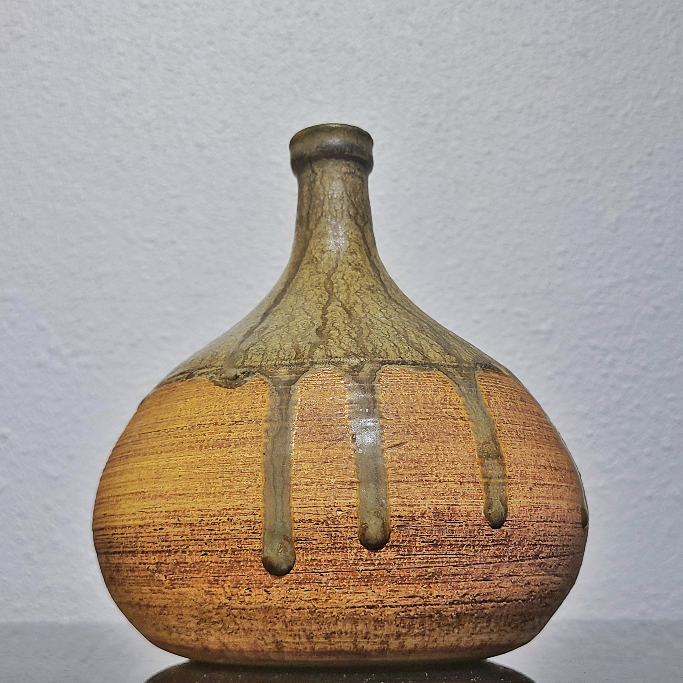 BULBOUS THIN NECKED STUDIO POTTERY VASE WITH GREEN DRIP