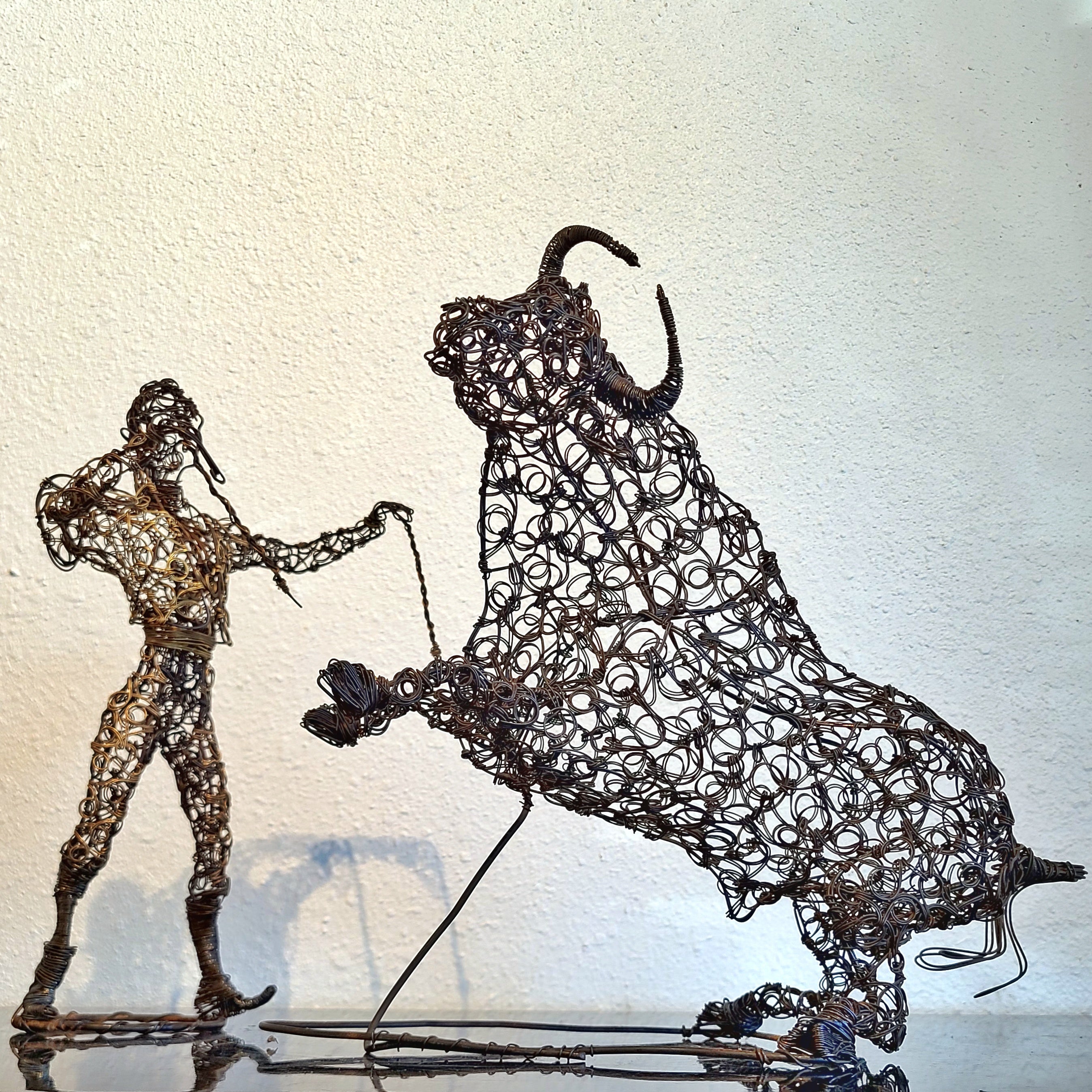 TWISTED WIRE SCULPTURE OF BANDERILLERO AND BULL