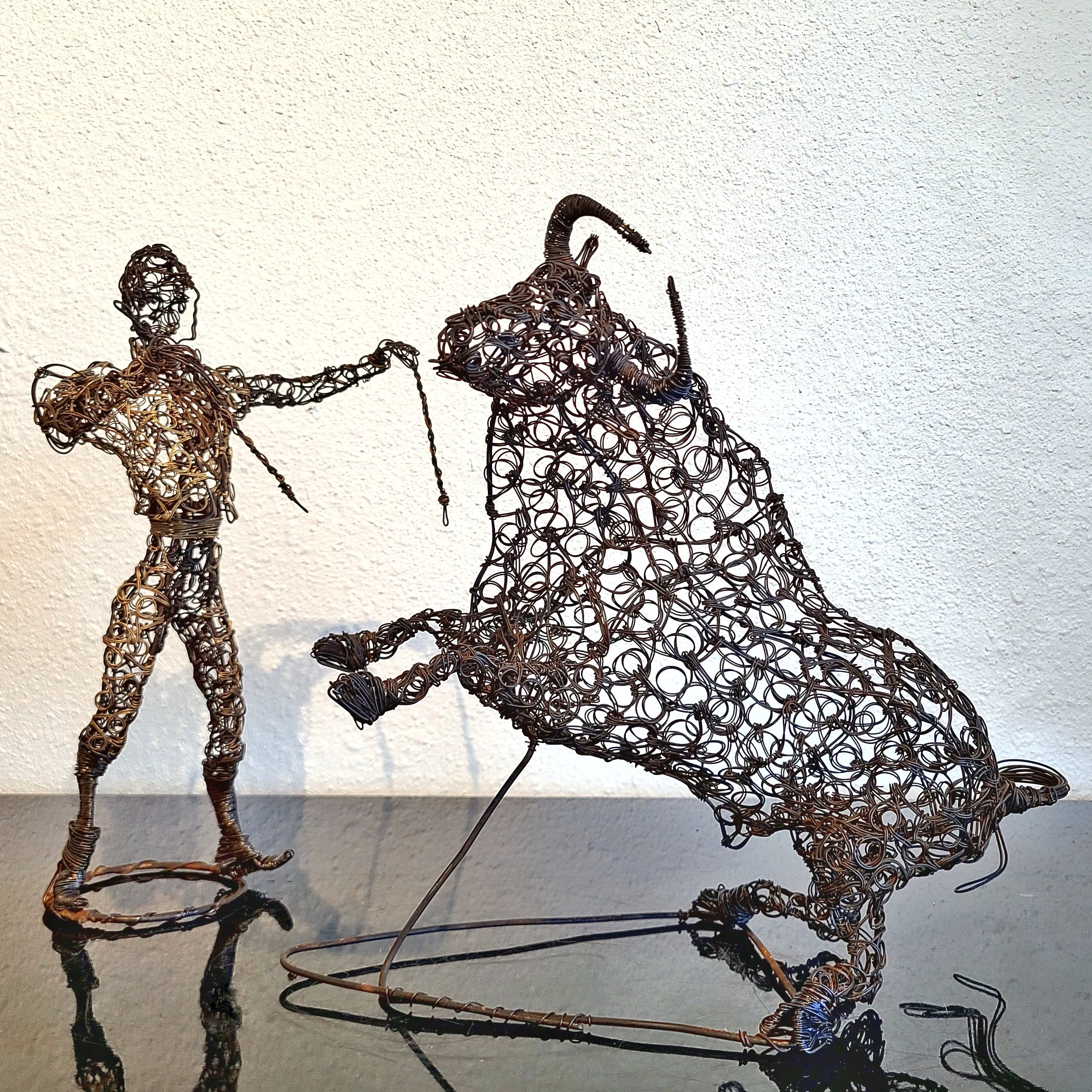 TWISTED WIRE SCULPTURE OF BANDERILLERO AND BULL