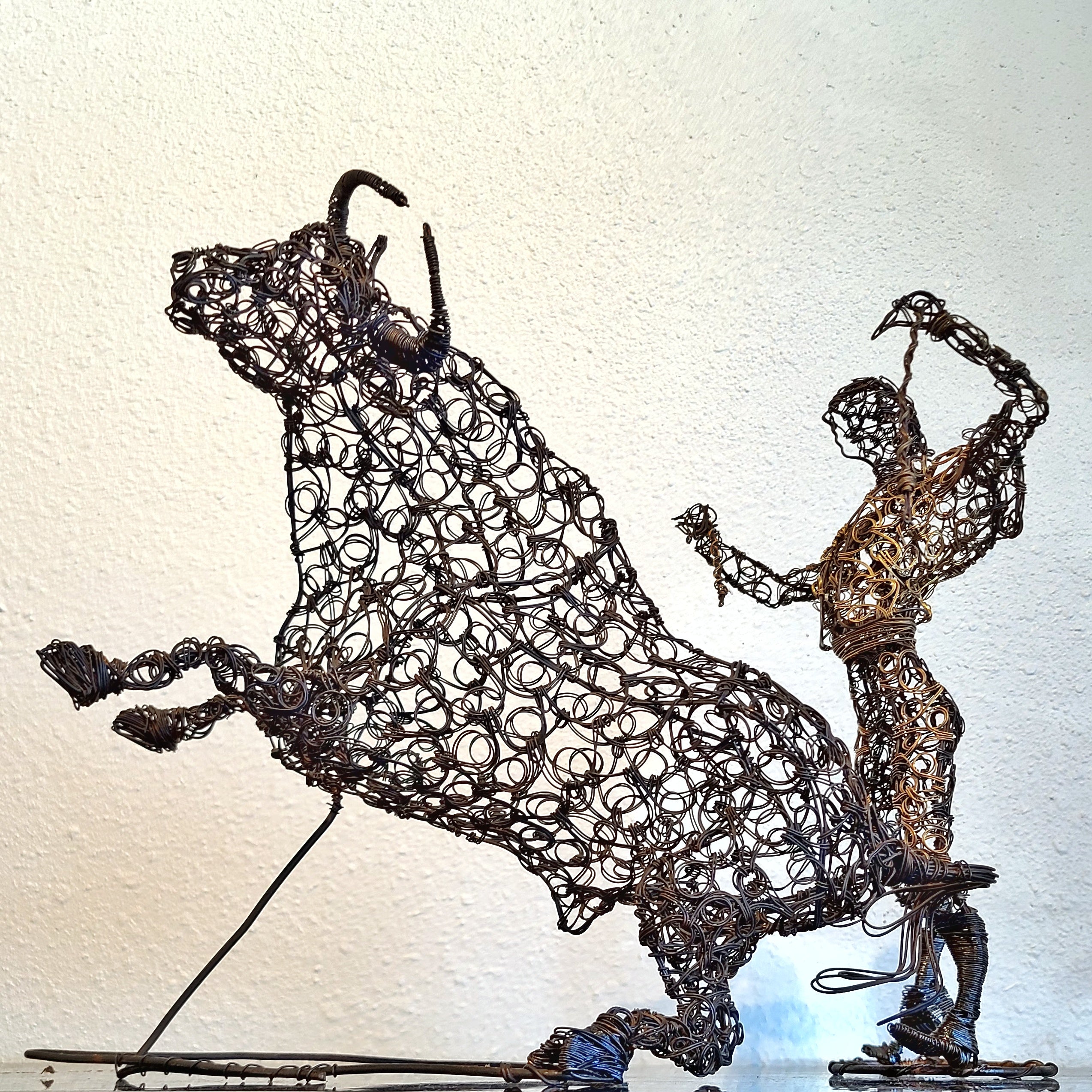 TWISTED WIRE SCULPTURE OF BANDERILLERO AND BULL