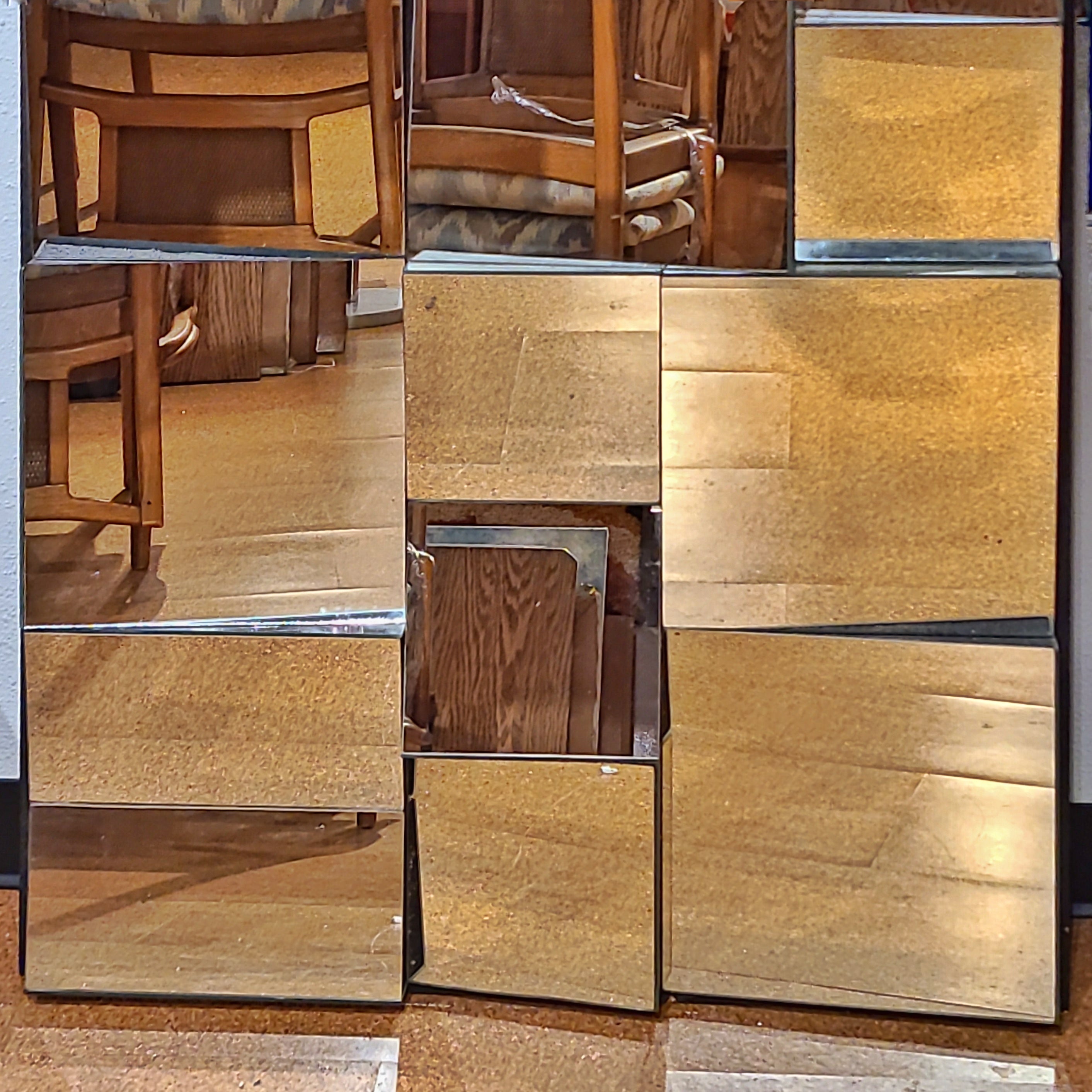 LARGE FACETED WALL MIRROR IN THE STYLE OF NEAL SMALL