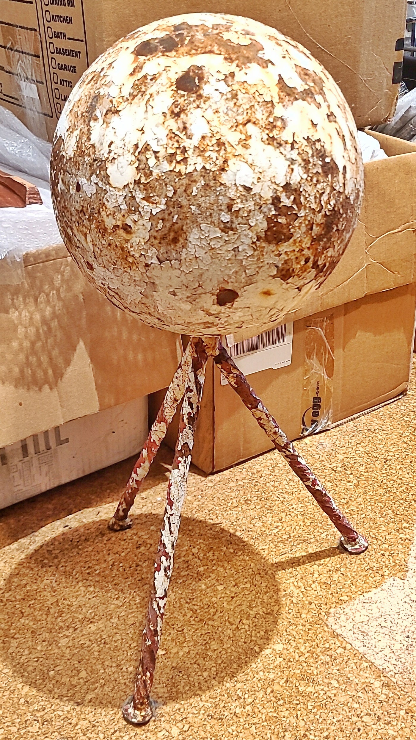 HEAVY IRON GARDEN SPHERE ON TWISTED IRON TRIPOD BASE (1940s)