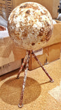 HEAVY IRON GARDEN SPHERE ON TWISTED IRON TRIPOD BASE (1940s)