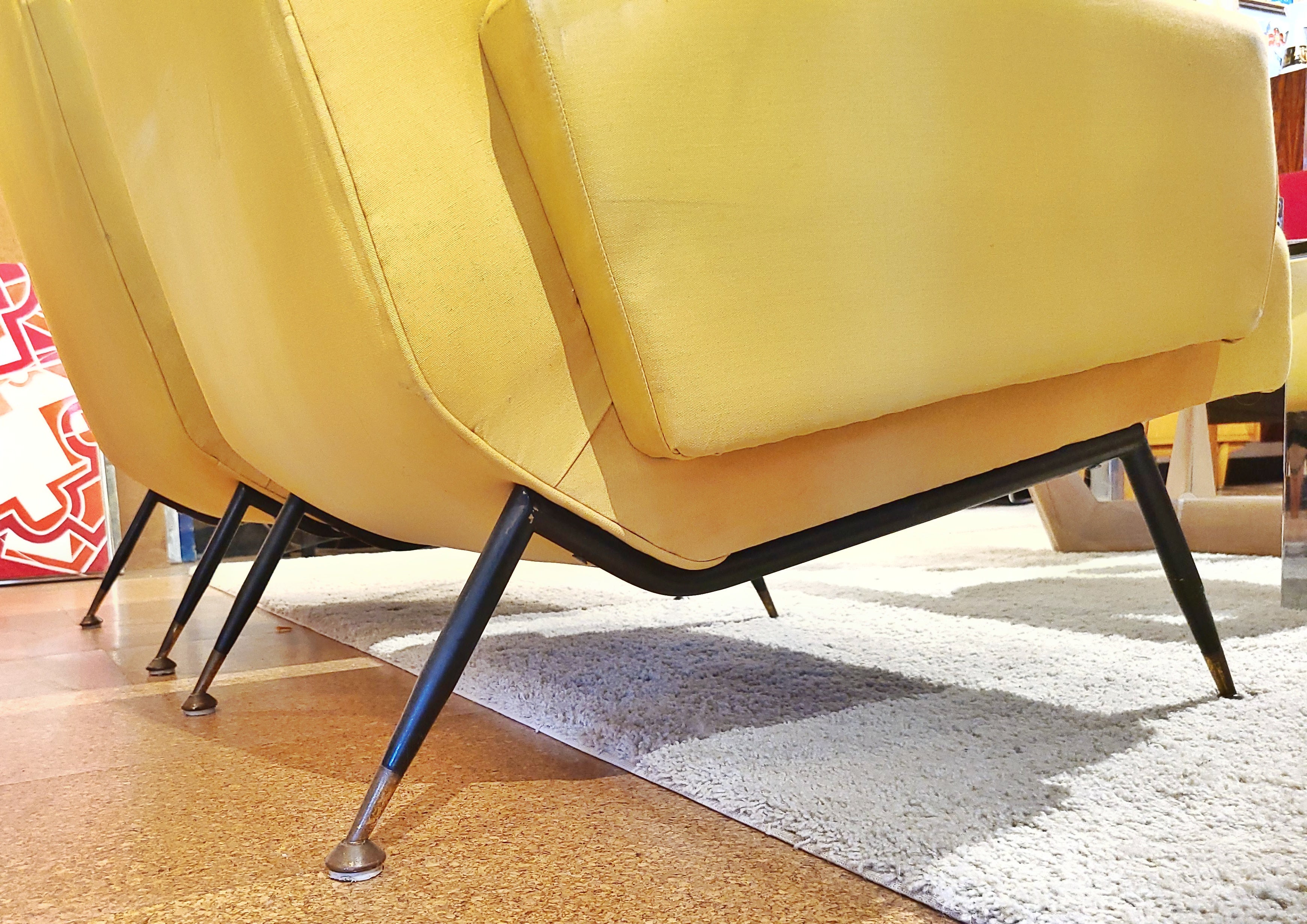 YELLOW ITALIAN LOUNGE CHAIRS ON BLACK ENAMELED STEEL LEGS