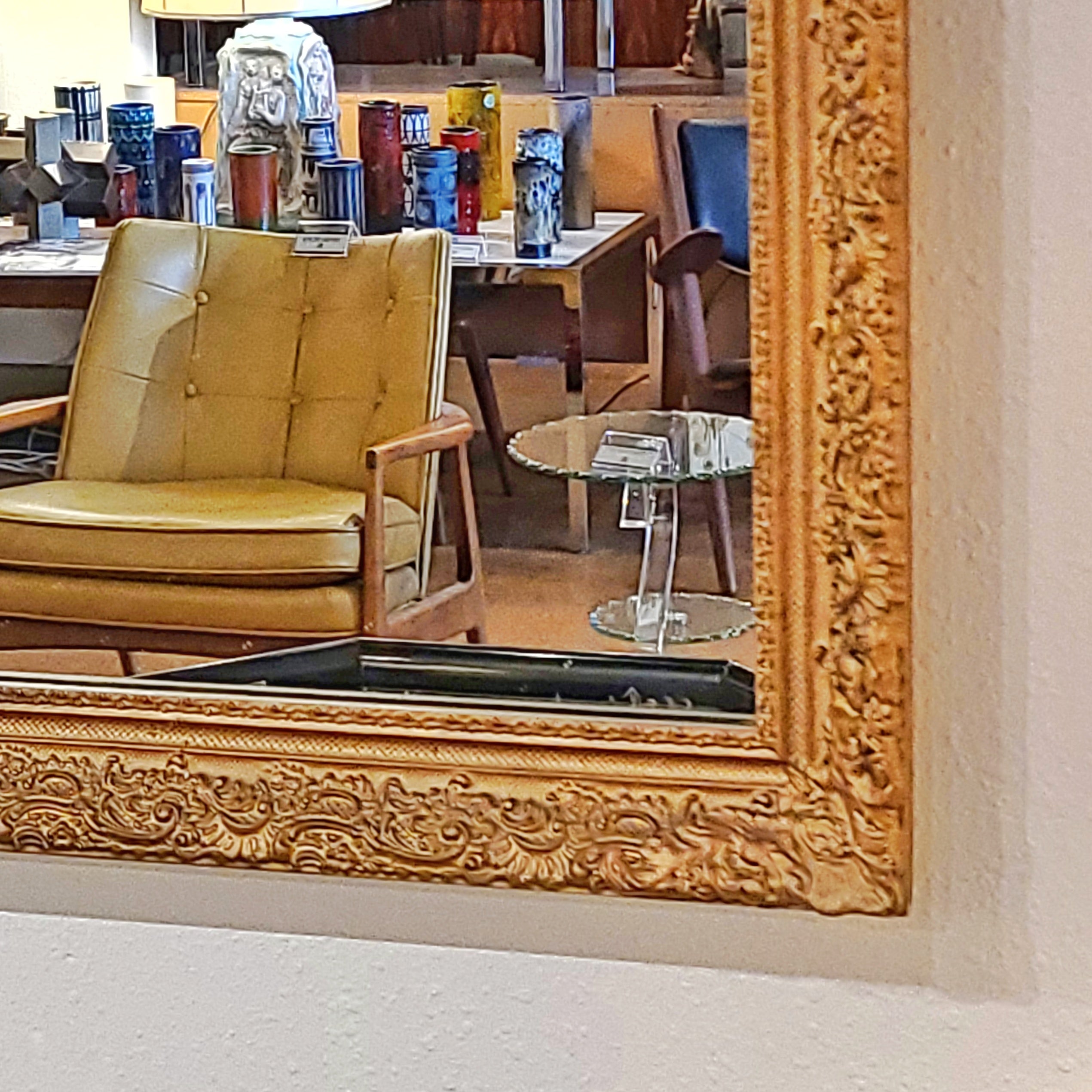 LARGE MIRROR IN A LATE BAROQUE/ROCOCO STYLE GILT FRAME