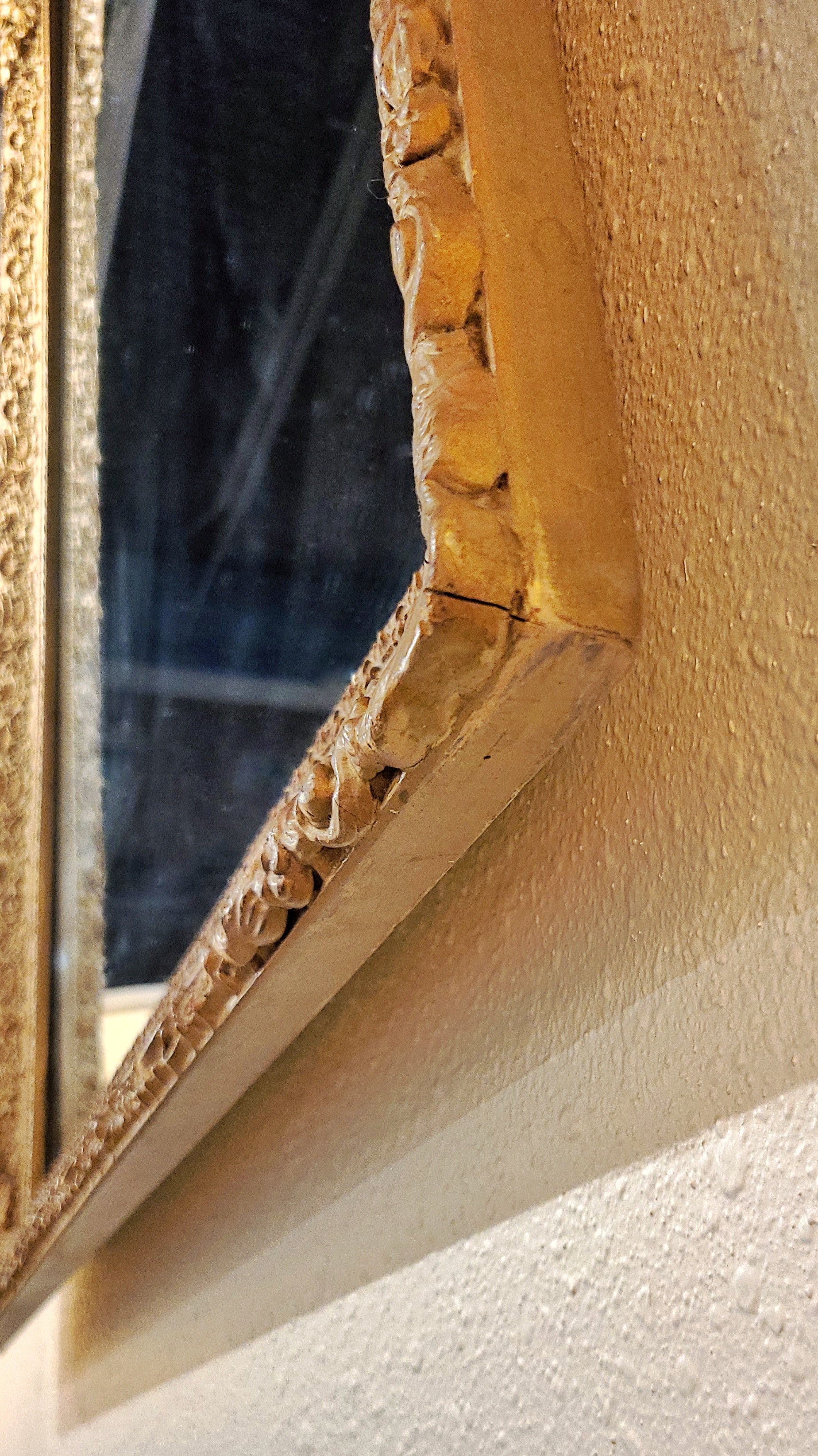 LARGE MIRROR IN A LATE BAROQUE/ROCOCO STYLE GILT FRAME