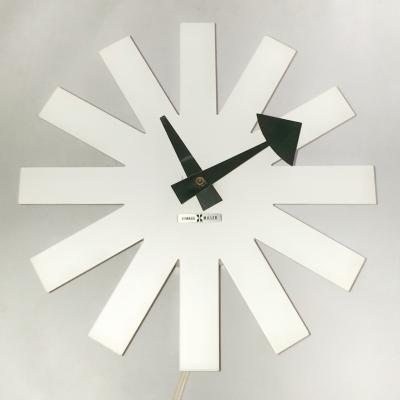IRVING HARPER MODEL 2213 ‘ASTERISK’ CLOCK FOR HOWARD MILLER (1964)