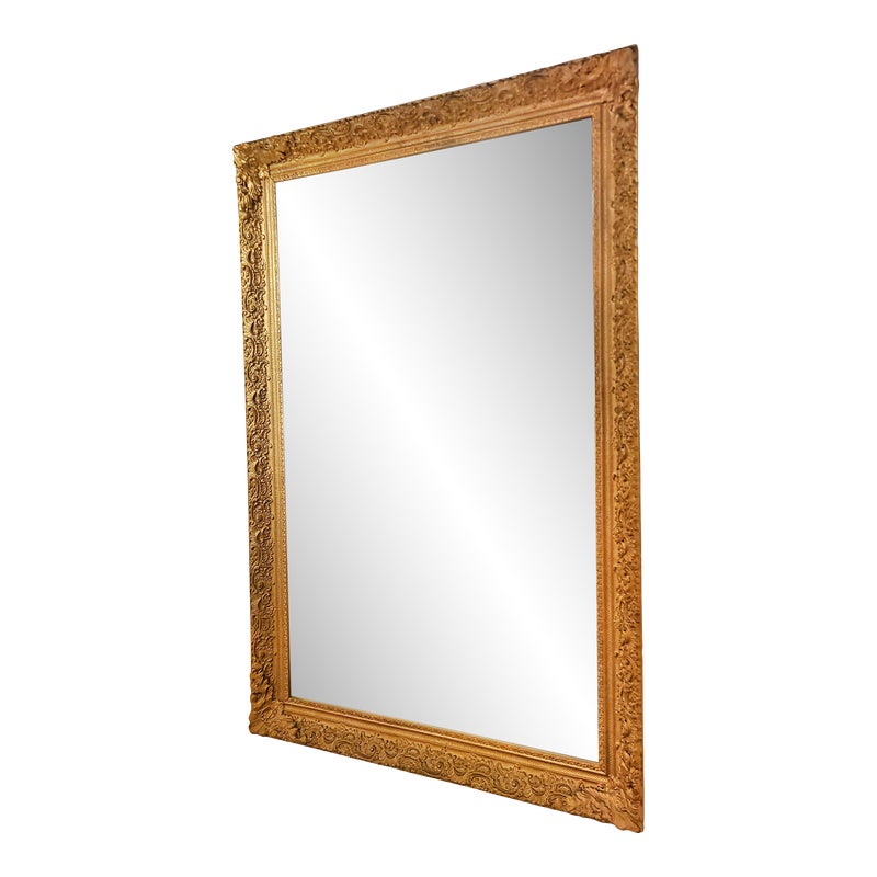 LARGE MIRROR IN A LATE BAROQUE/ROCOCO STYLE GILT FRAME