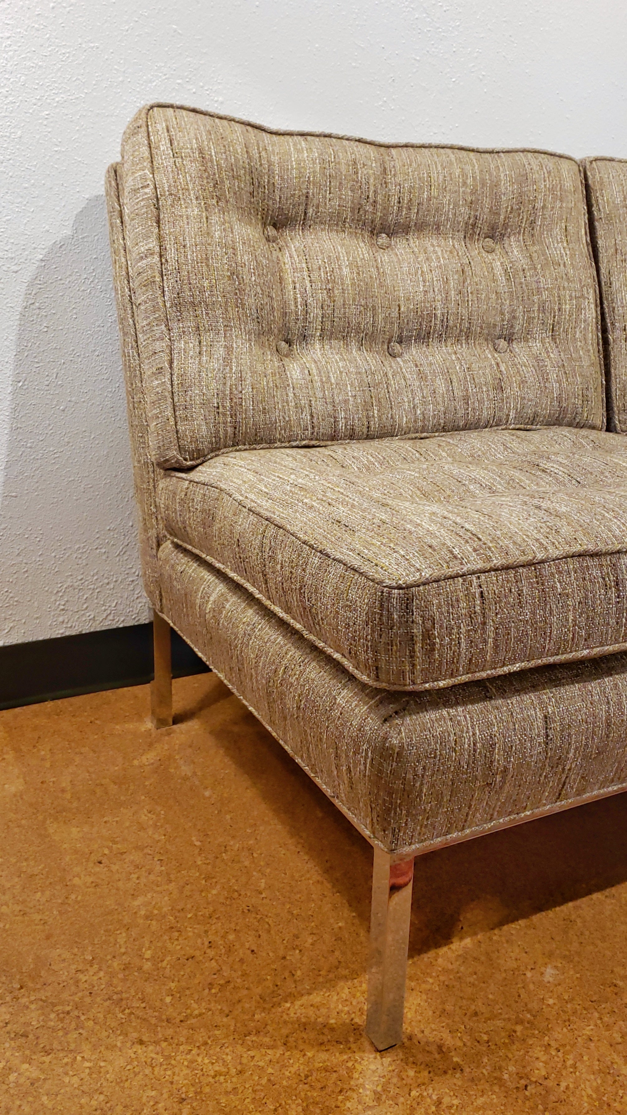 ARMLESS SOFA WITH CHROMED STEEL PLATFORM BASE