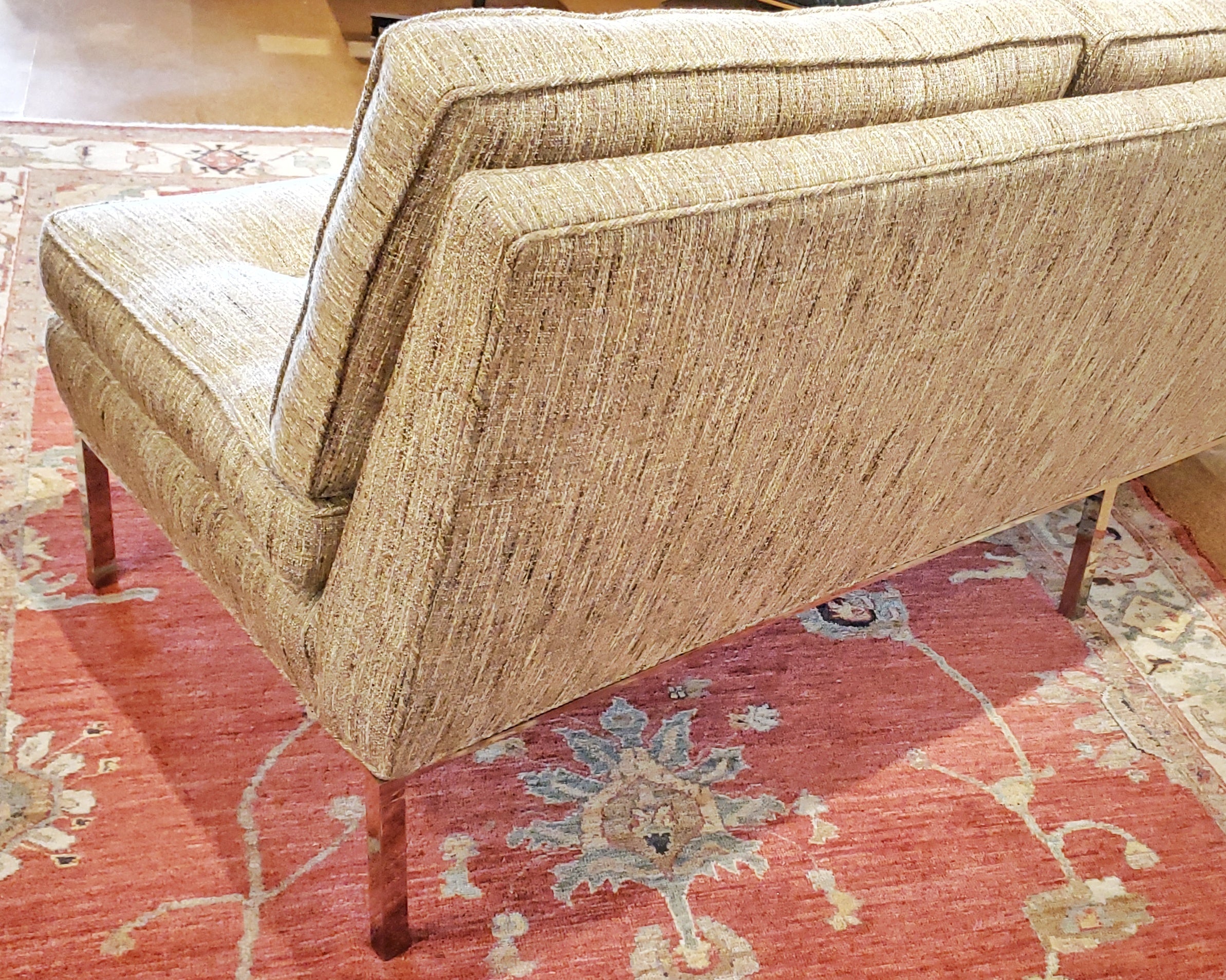 ARMLESS SOFA WITH CHROMED STEEL PLATFORM BASE