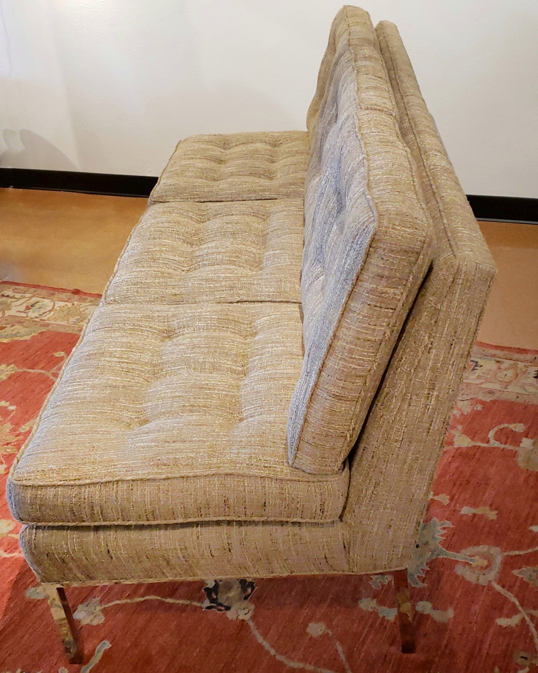 ARMLESS SOFA WITH CHROMED STEEL PLATFORM BASE