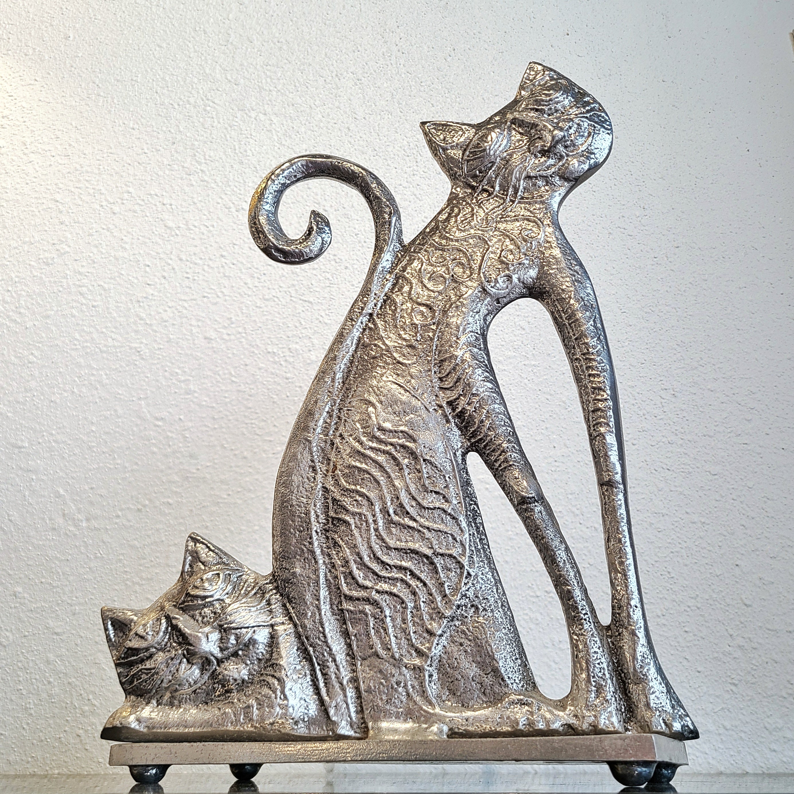 DON DRUMM SAND-CAST ALUMINUM ‘CATS’ DOORSTOP