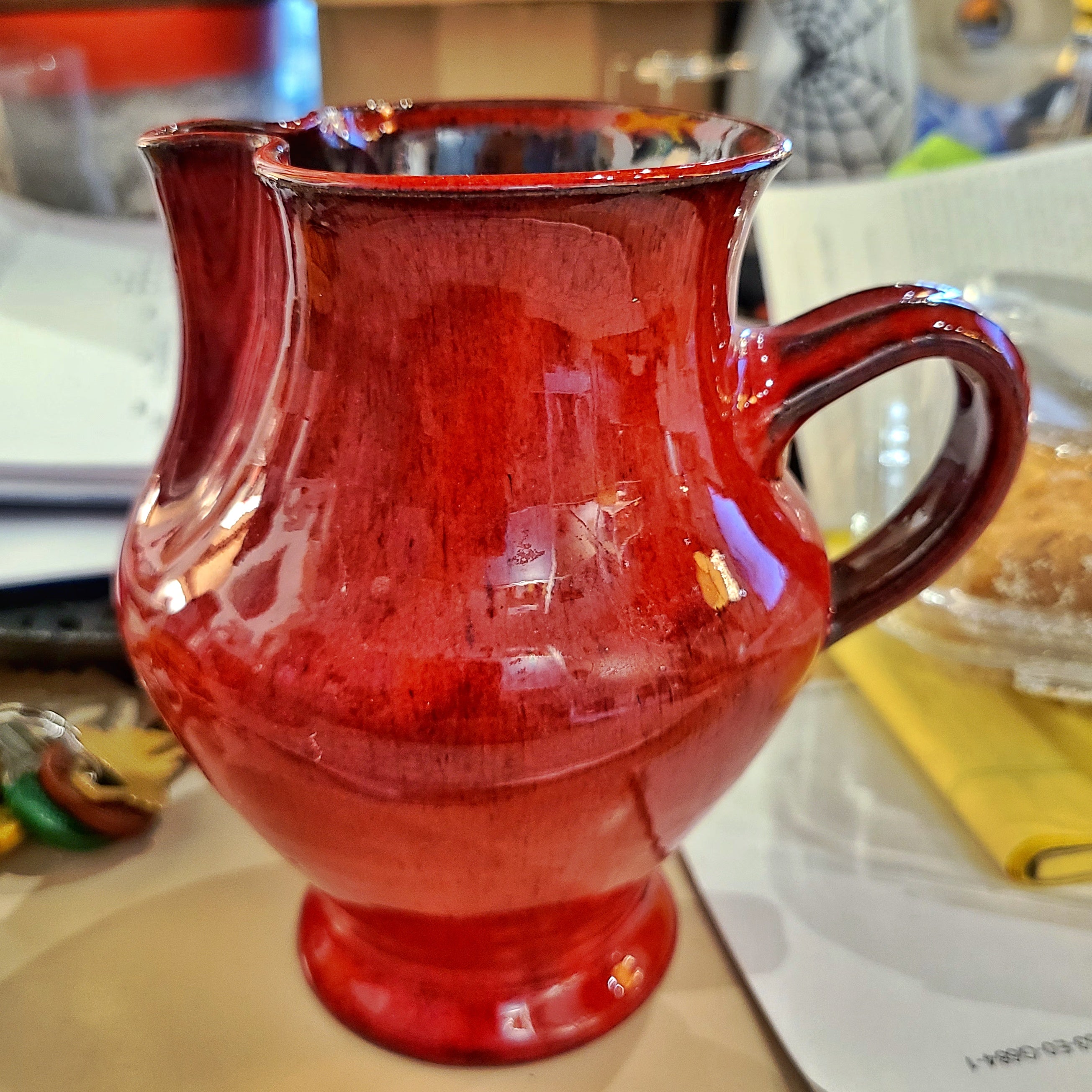 SMALL RED WILHELM & ELLY KUCH PINCHED SPOUT PITCHER