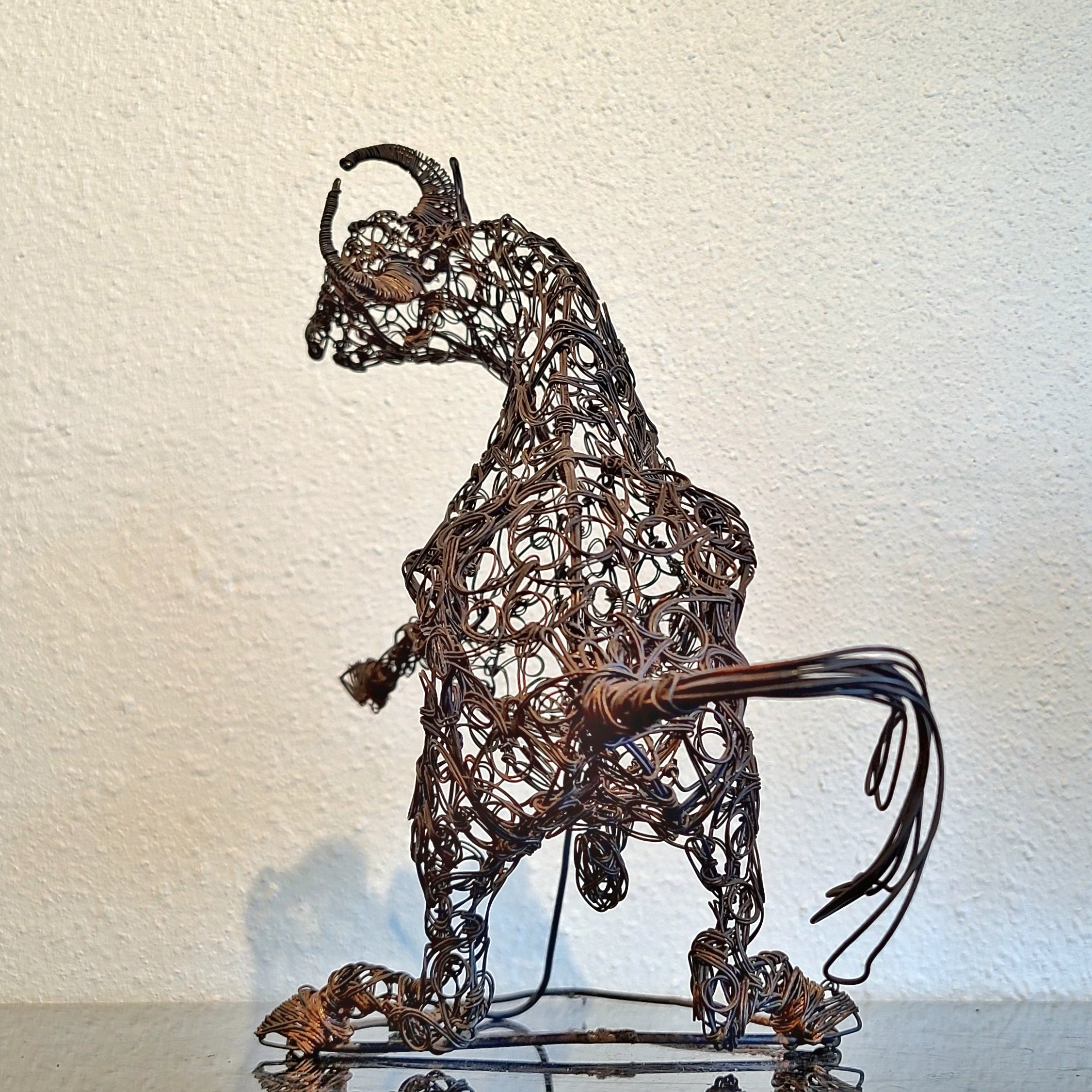 WIRE SCULPTURE OF BANDERILLERO AND BULL