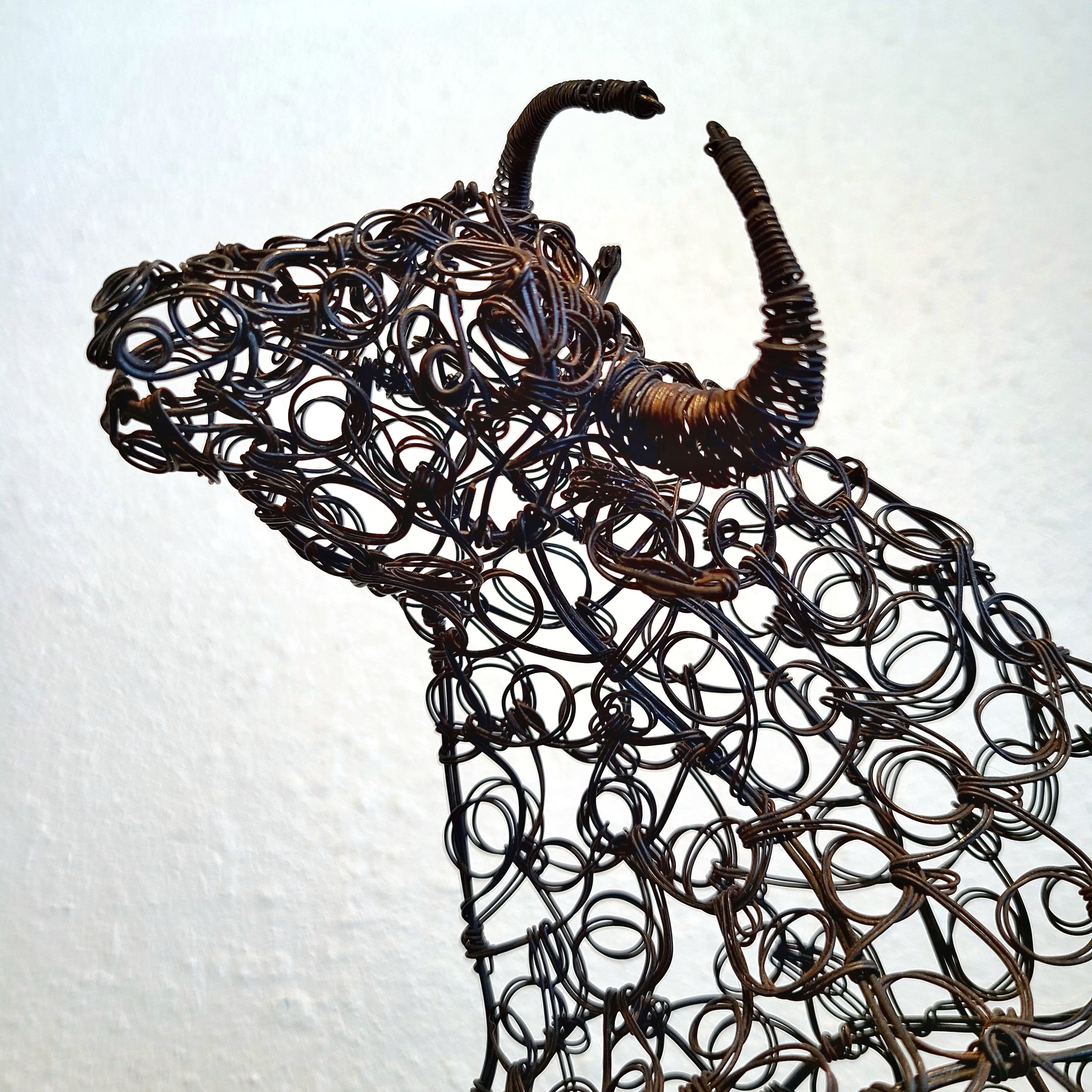 WIRE SCULPTURE OF BANDERILLERO AND BULL