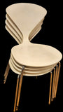 SET OF FOUR WHITE LACQUER  STACKING CHAIRS BY NORMAN CHERNER