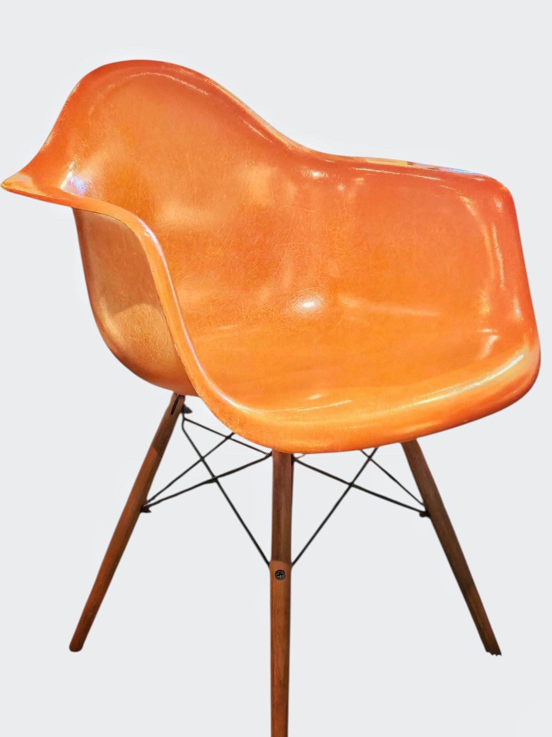 ORANGE EAMES MOLDED FIBERGLASS ‘DAW’ ARMCHAIR WITH NEW DOWEL BASE (2 AVAILABLE)