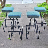 PAIR OF IRON BARSTOOLS AFTER FREDERICK WEINBERG