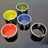 BOXED SET OF STACKING ASHTRAYS BY ISAMU KENMOCHI (FIVE)