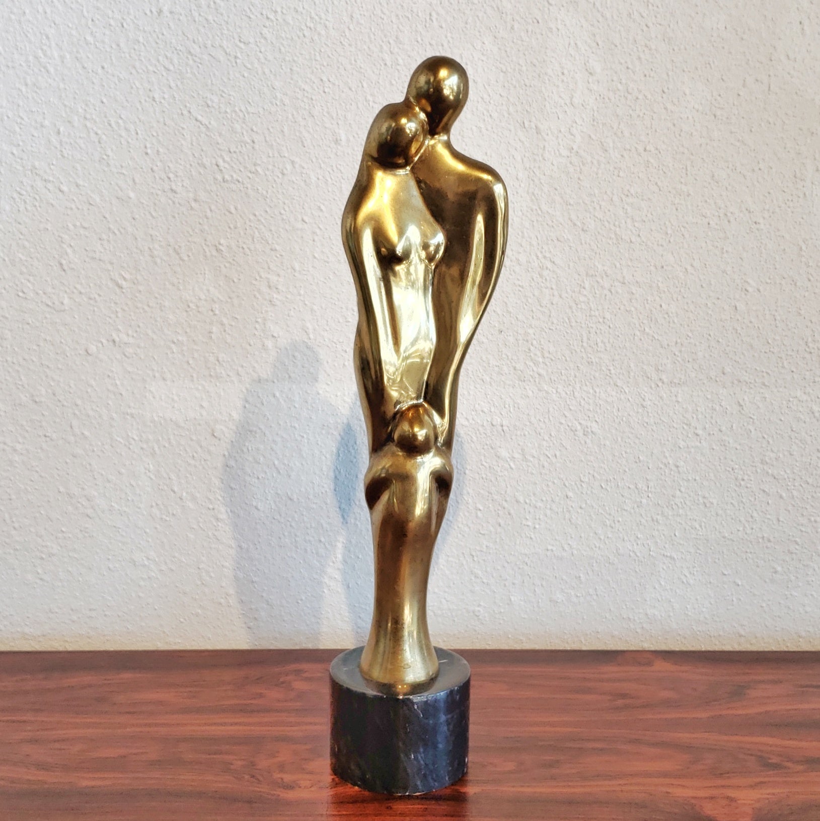 SOLID-BRASS FAMILY STATUETTE AFTER JEAN ARP