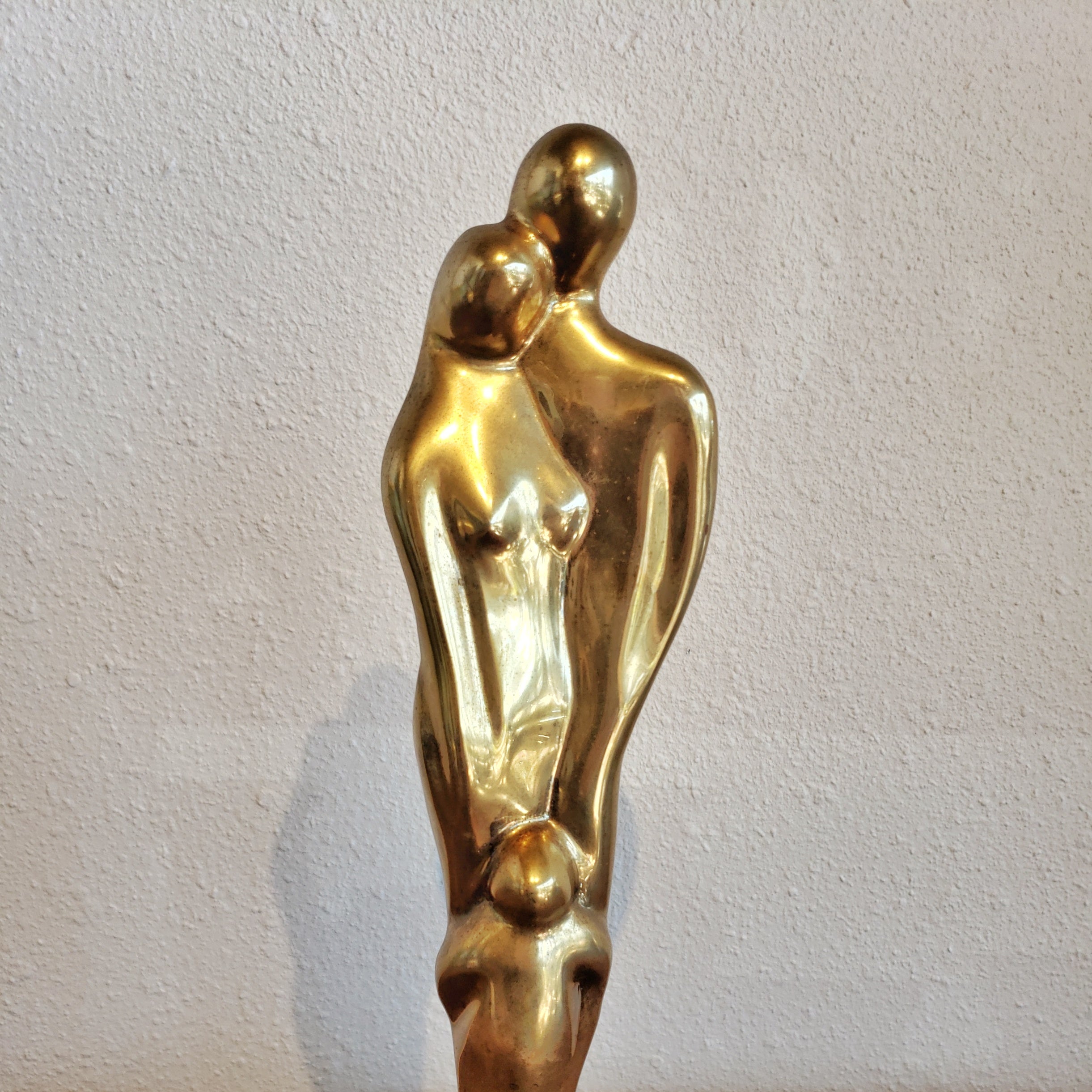 SOLID-BRASS FAMILY STATUETTE AFTER JEAN ARP