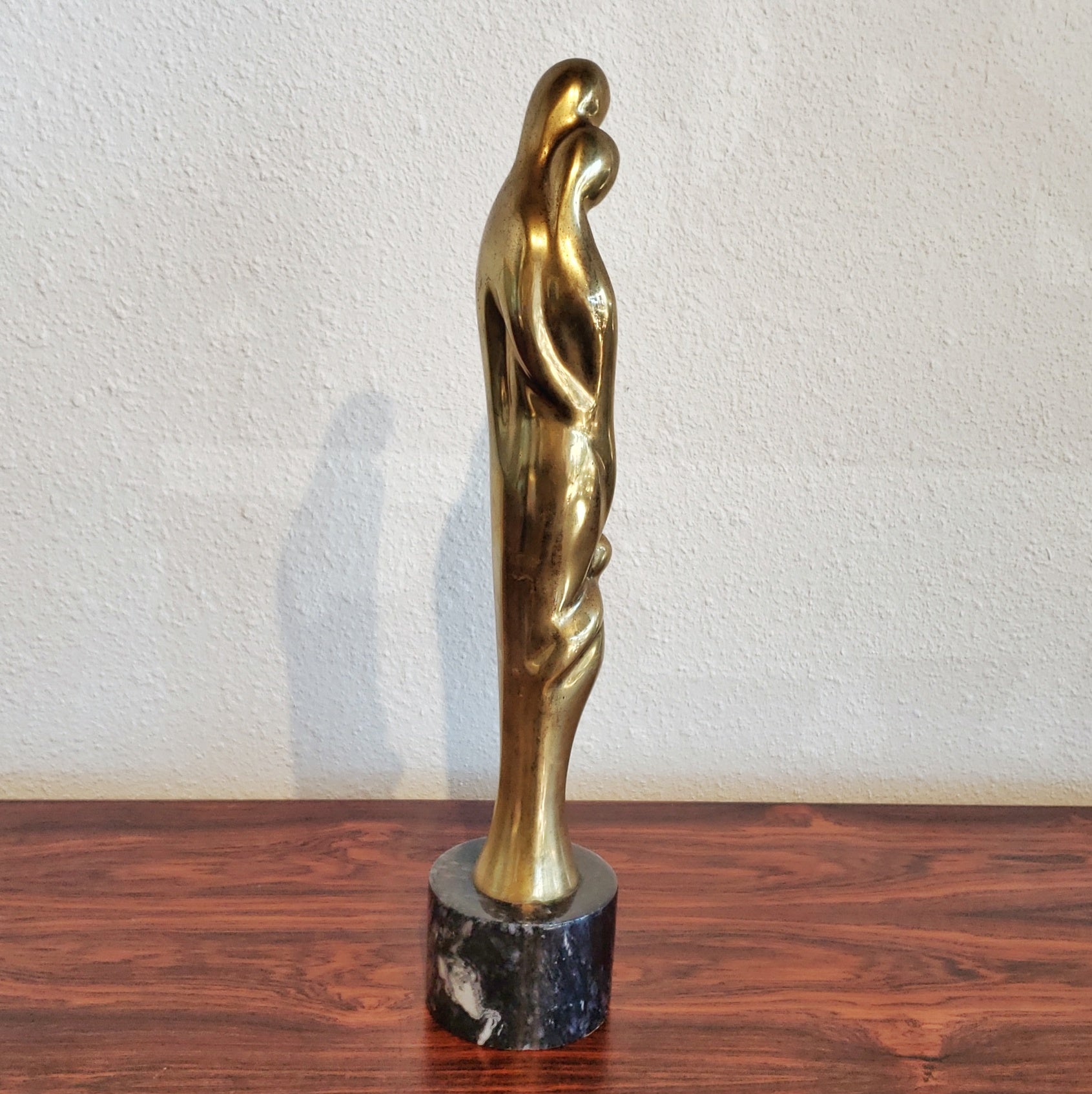 SOLID-BRASS FAMILY STATUETTE AFTER JEAN ARP