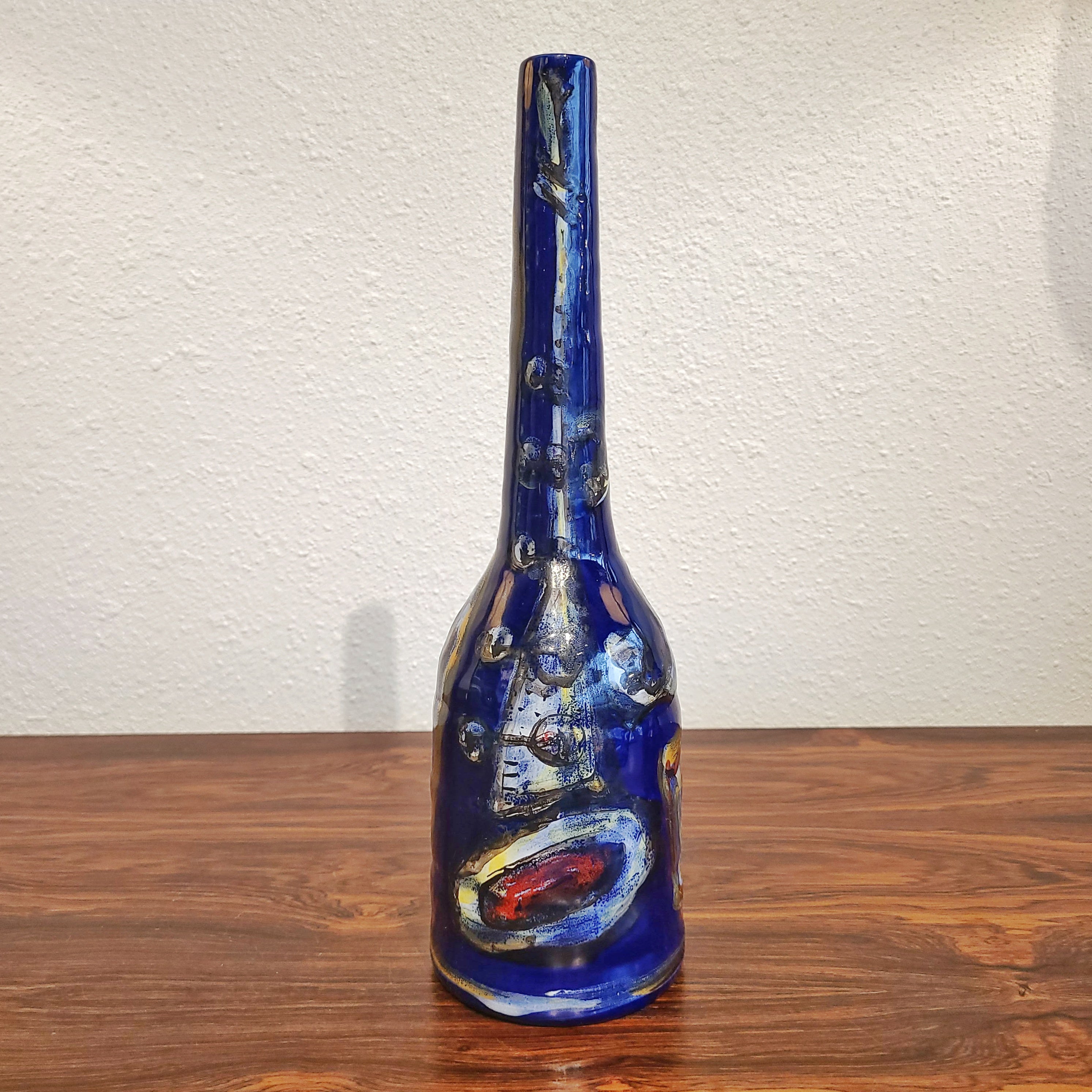 PETUCCO & TOLIO BOTTLE VASE WITH MUSICAL MOTIF MARKED "P.T. 964"