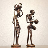 STYLIZED MID CENTURY BURKINA FASO BRONZE VILLAGERS (PAIR)