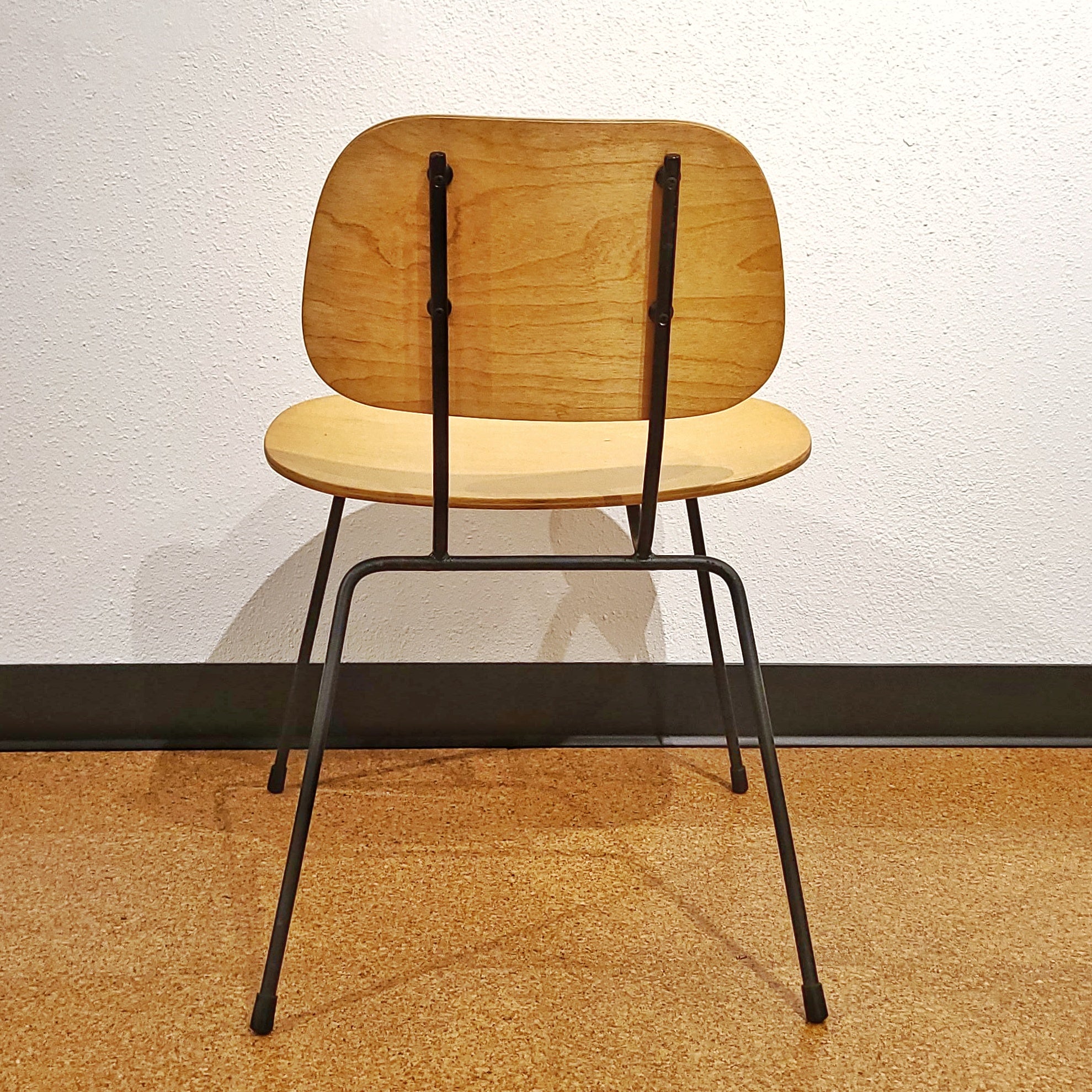 FOUR PLYWOOD AND IRON CHAIRS IN THE MANNER OF WIM RIETVELD