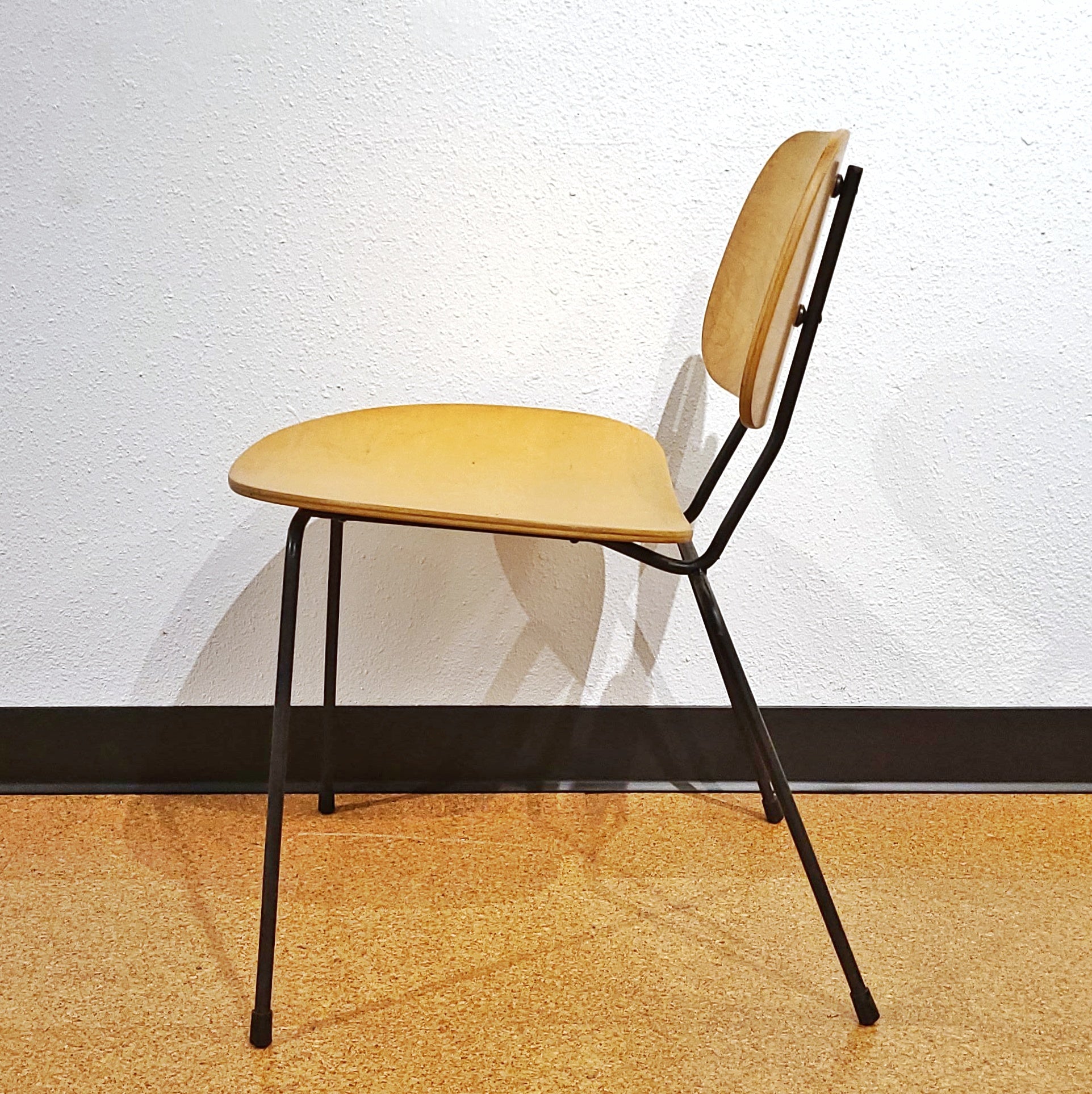 FOUR PLYWOOD AND IRON CHAIRS IN THE MANNER OF WIM RIETVELD