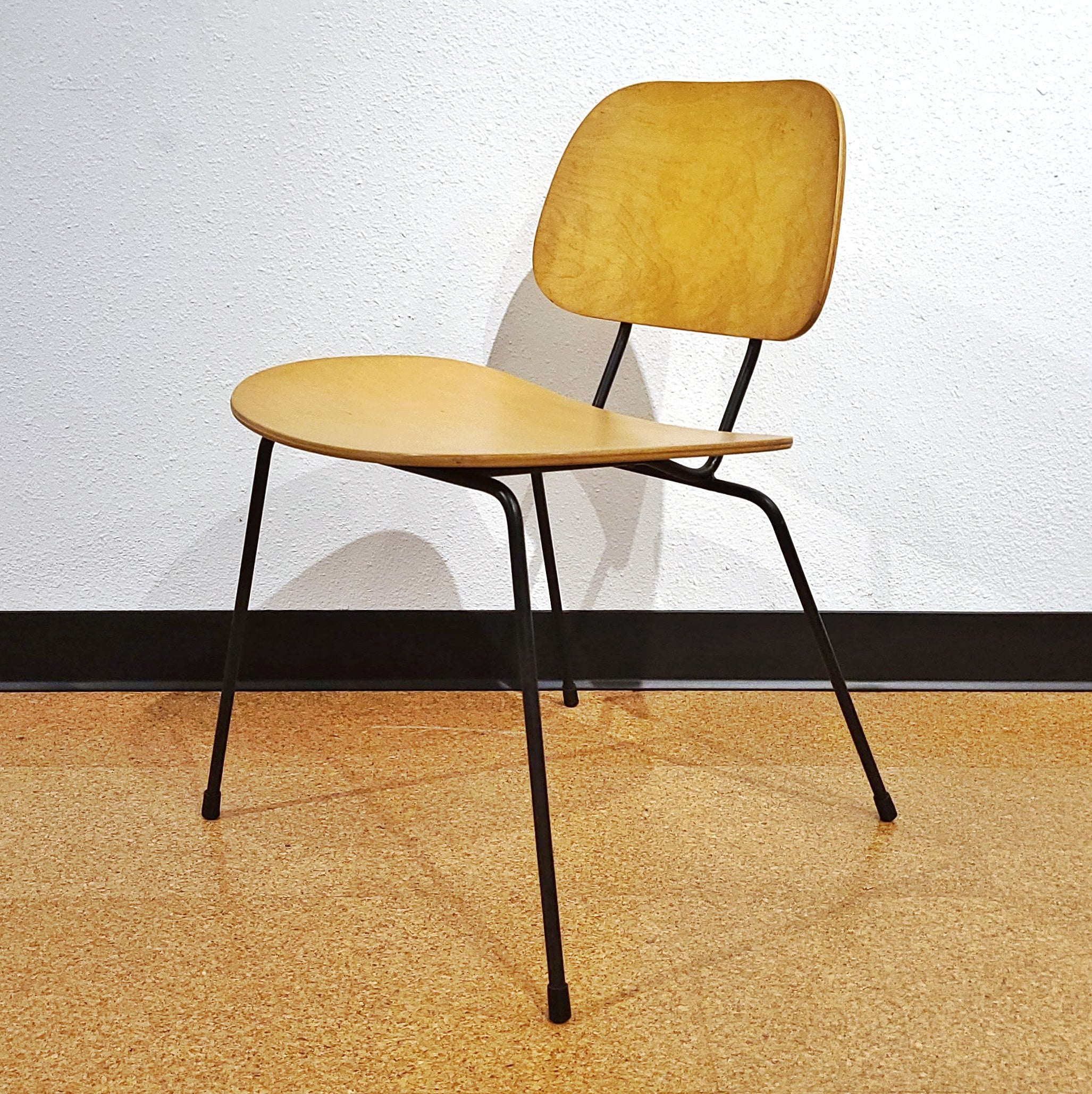 FOUR PLYWOOD AND IRON CHAIRS IN THE MANNER OF WIM RIETVELD