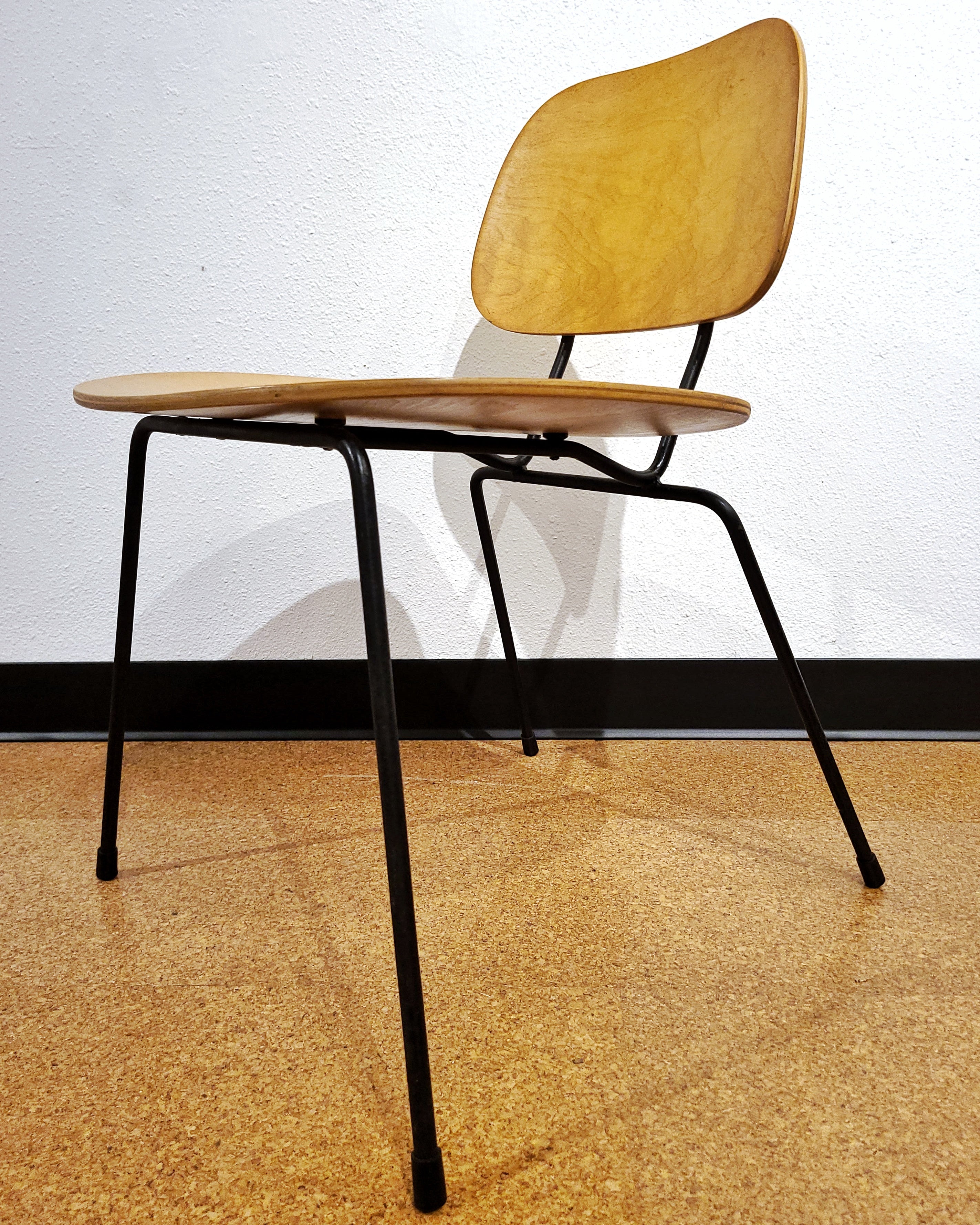 FOUR PLYWOOD AND IRON CHAIRS IN THE MANNER OF WIM RIETVELD