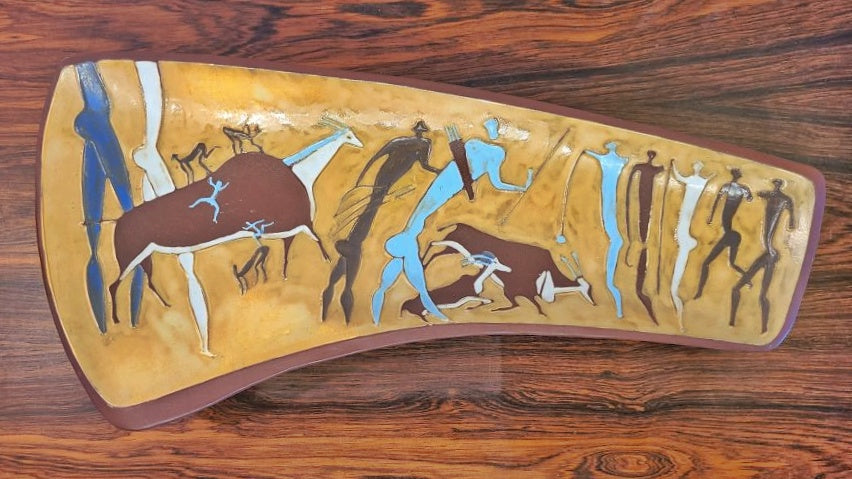 ASYMMETRICAL TRIPOD BOWL WITH PREHISTORIC HUNTING SCENE