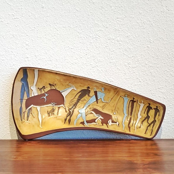 ASYMMETRICAL TRIPOD BOWL WITH PREHISTORIC HUNTING SCENE