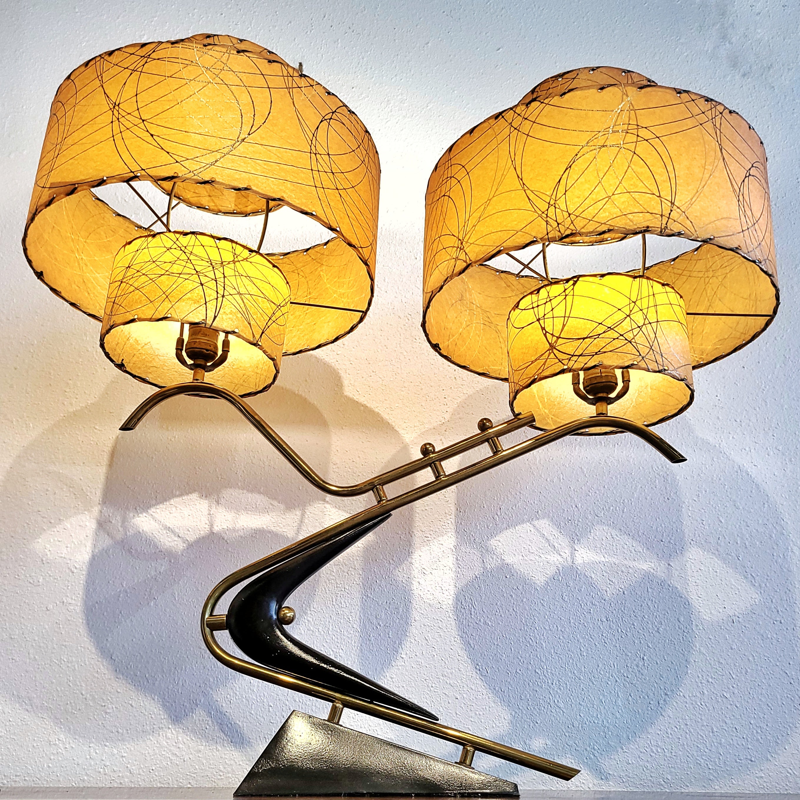 1950s BOOMERANG TABLE LAMPS WITH TRIPLE LEVEL FIBERGLASS SHADES (PAIR)
