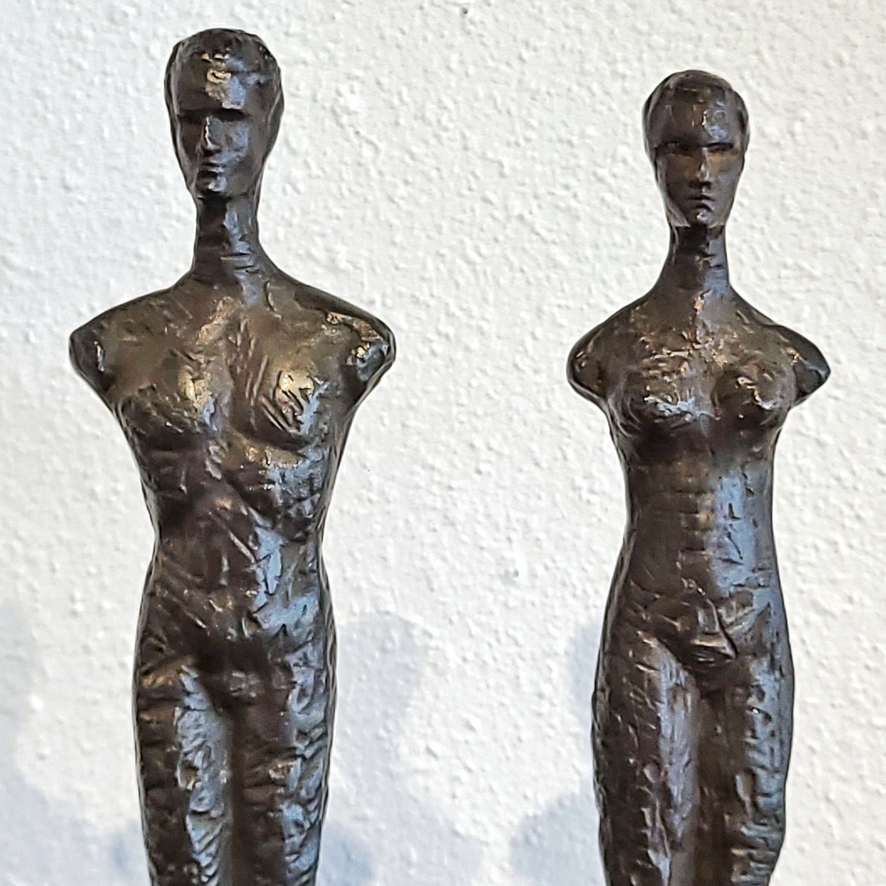 SLENDER ARMLESS COUPLE IN CAST BRONZE ON QUARTZ BASES