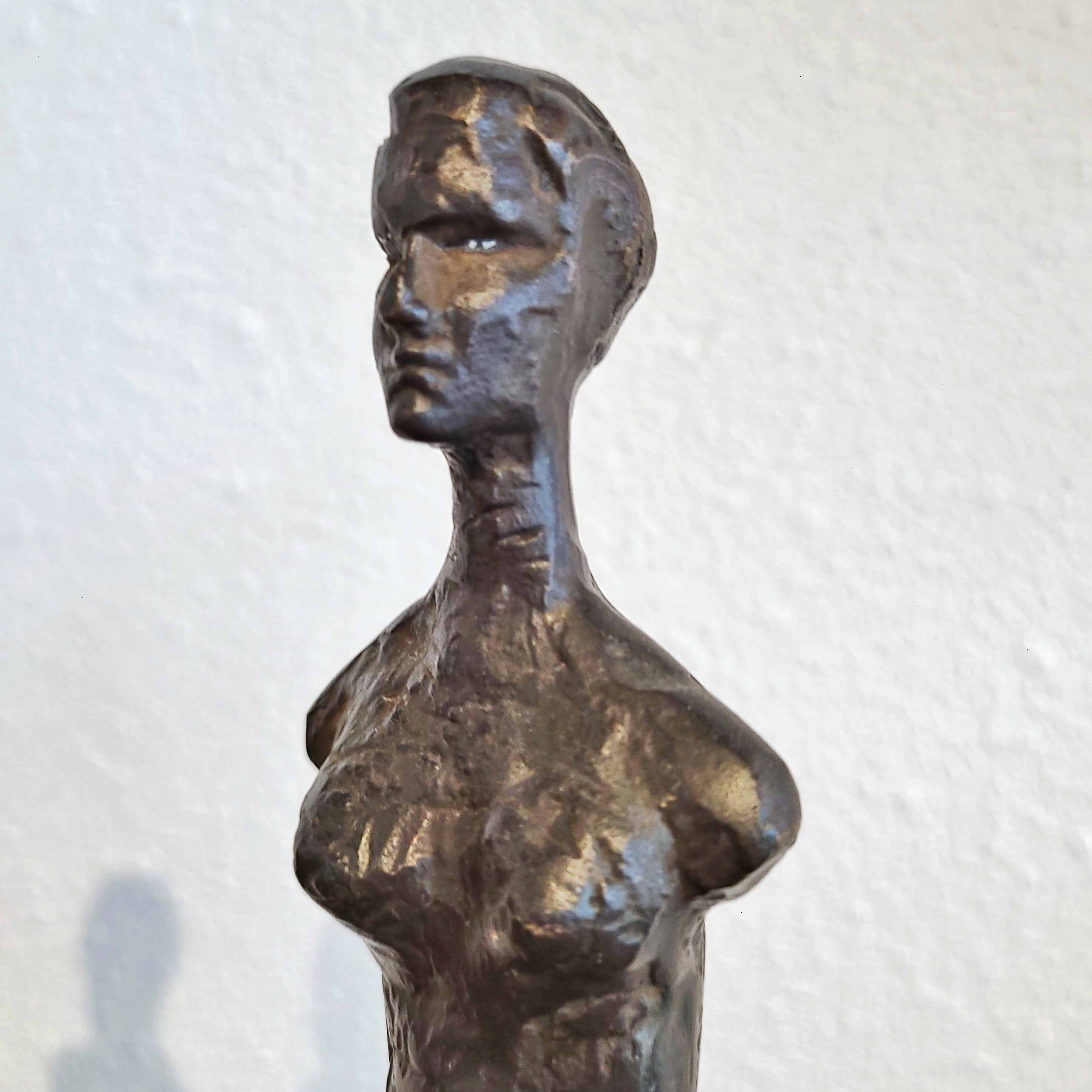 SLENDER ARMLESS COUPLE IN CAST BRONZE ON QUARTZ BASES