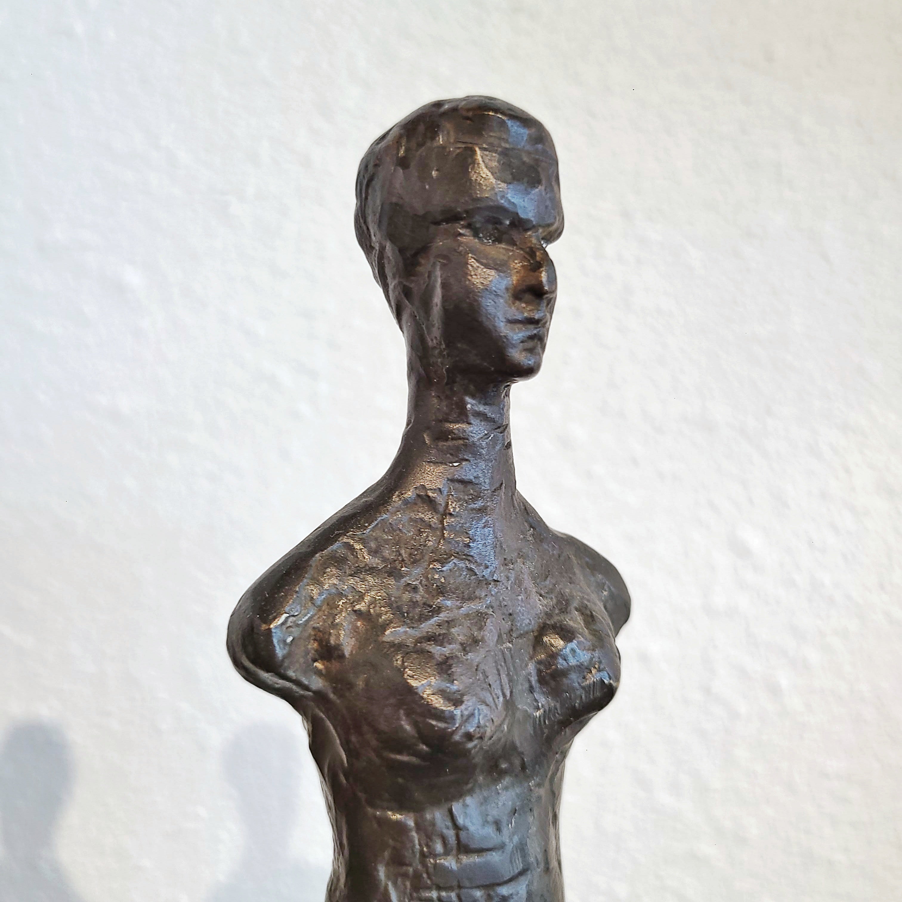 SLENDER ARMLESS COUPLE IN CAST BRONZE ON QUARTZ BASES