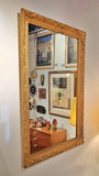 LARGE MIRROR IN A LATE BAROQUE/ROCOCO STYLE GILT FRAME