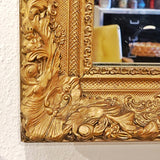 LARGE MIRROR IN A LATE BAROQUE/ROCOCO STYLE GILT FRAME