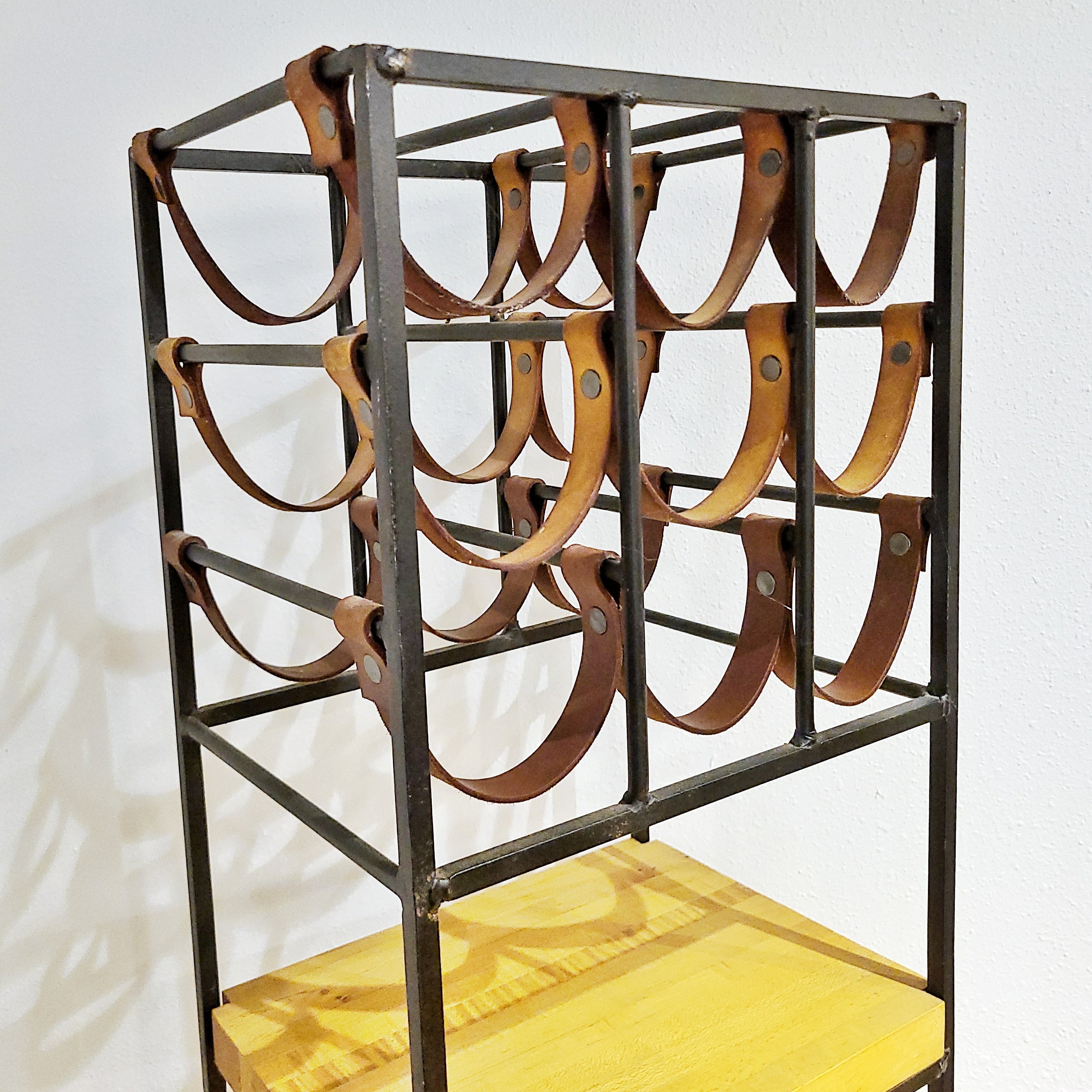 ARTHUR UMANOFF IRON AND LEATHER WINE RACK FOR SHAVER HOWARD