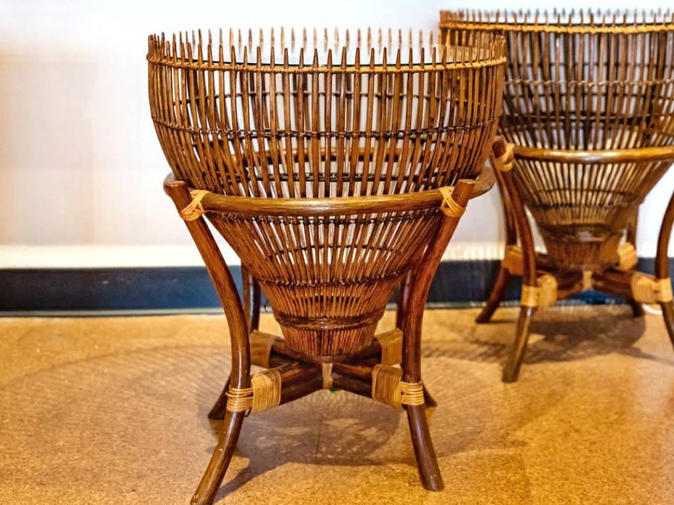 RATTAN AND GLASS “FISH-TRAP” SIDE TABLES IN THE STYLE OF FRANCO ALBINI